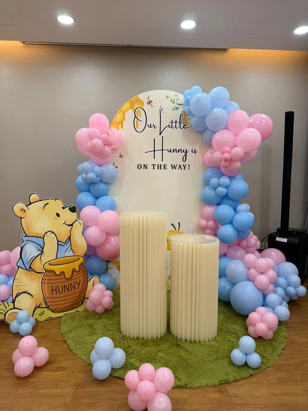 A Winnie the Pooh-themed gender reveal backdrop, "Our Little Hunny is on the way", built by LinkNow Events Co.