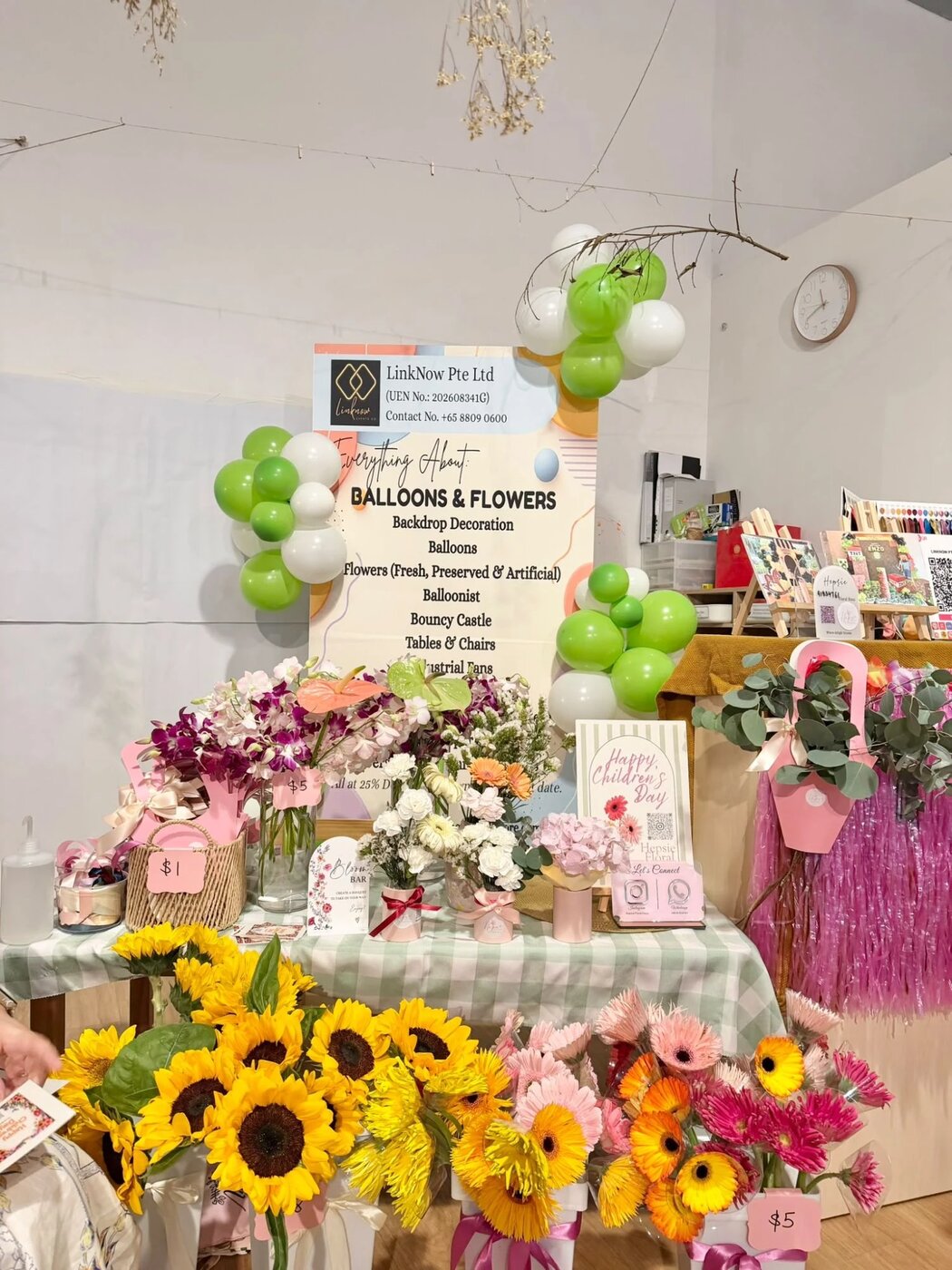 Balloon and floral display styled for Bucket House Preschool